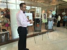 Kettering Medical Center Chaplain Elliott Smith speaks at a prayer vigil at the hospital.